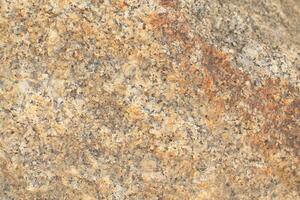 Abstract natural rock stone granite grunge rusty metal texture design background natural color stone material granite design wallpaper. Close-up detail of natural stone photo