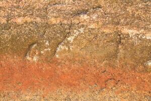 Abstract natural rock stone granite grunge rusty metal texture design background natural color stone material granite design wallpaper. Close-up detail of natural stone photo