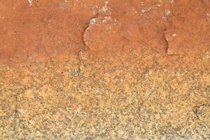 Abstract natural rock stone granite grunge rusty metal texture design background natural color stone material granite design wallpaper. Close-up detail of natural stone photo