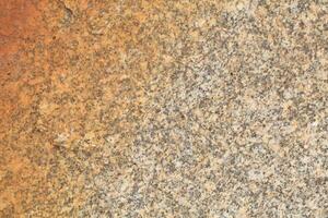 Abstract natural rock stone granite grunge rusty metal texture design background natural color stone material granite design wallpaper. Close-up detail of natural stone photo