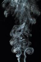 Abstract white smoke texture moves on black background Plume of smoke wave design wallpaper. Design element. Abstract texture photo
