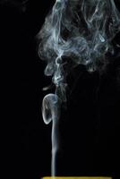 Abstract white smoke texture moves on black background Plume of smoke wave design wallpaper. Design element. Abstract texture photo