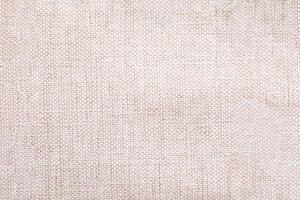 Natural linen material textile canvas Fabric texture background Close-up detail of fabric natural color Hemp material pattern design wallpaper. can be used as background or for graphic design photo