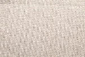 Natural linen material textile canvas Fabric texture background Close-up detail of fabric natural color Hemp material pattern design wallpaper. can be used as background or for graphic design photo