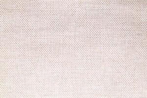 Natural linen material textile canvas Fabric texture background Close-up detail of fabric natural color Hemp material pattern design wallpaper. can be used as background or for graphic design photo