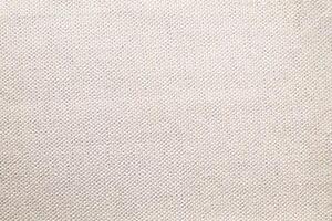 Natural linen material textile canvas Fabric texture background Close-up detail of fabric natural color Hemp material pattern design wallpaper. can be used as background or for graphic design photo