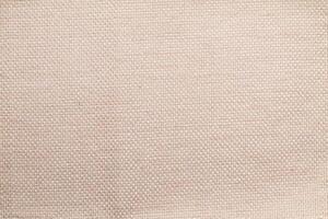 Natural linen material textile canvas Fabric texture background Close-up detail of fabric natural color Hemp material pattern design wallpaper. can be used as background or for graphic design photo