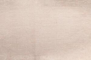 Natural linen material textile canvas Fabric texture background Close-up detail of fabric natural color Hemp material pattern design wallpaper. can be used as background or for graphic design photo