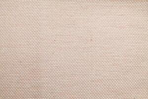 Natural linen material textile canvas Fabric texture background Close-up detail of fabric natural color Hemp material pattern design wallpaper. can be used as background or for graphic design photo