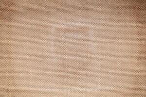 Natural linen material textile canvas Fabric texture background Close-up detail of fabric natural color Hemp material pattern design wallpaper. can be used as background or for graphic design photo