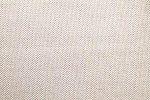 Natural linen material textile canvas Fabric texture background Close-up detail of fabric natural color Hemp material pattern design wallpaper. can be used as background or for graphic design photo