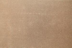 Natural linen material textile canvas Fabric texture background Close-up detail of fabric natural color Hemp material pattern design wallpaper. can be used as background or for graphic design photo