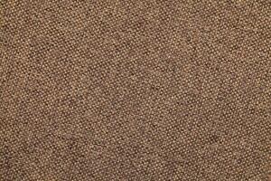 Natural linen material textile canvas Fabric texture background Close-up detail of fabric natural color Hemp material pattern design wallpaper. can be used as background or for graphic design photo