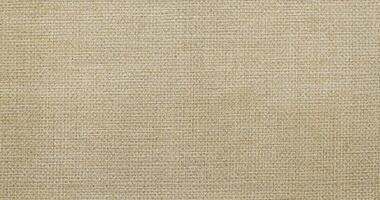 Natural linen material textile canvas Fabric texture background Close-up detail of fabric natural color Hemp material pattern design wallpaper. can be used as background or for graphic design photo