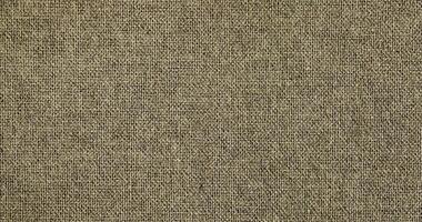 Natural linen material textile canvas Fabric texture background Close-up detail of fabric natural color Hemp material pattern design wallpaper. can be used as background or for graphic design photo