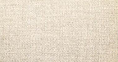 Natural linen material textile canvas Fabric texture background Close-up detail of fabric natural color Hemp material pattern design wallpaper. can be used as background or for graphic design photo