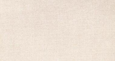 Natural linen material textile canvas Fabric texture background Close-up detail of fabric natural color Hemp material pattern design wallpaper. can be used as background or for graphic design photo
