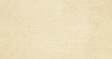 Natural linen material textile canvas Fabric texture background Close-up detail of fabric natural color Hemp material pattern design wallpaper. can be used as background or for graphic design photo