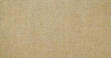 Natural linen material textile canvas Fabric texture background Close-up detail of fabric natural color Hemp material pattern design wallpaper. can be used as background or for graphic design photo