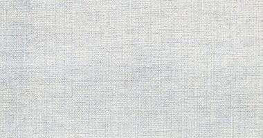 Natural linen material textile canvas Fabric texture background Close-up detail of fabric natural color Hemp material pattern design wallpaper. can be used as background or for graphic design photo