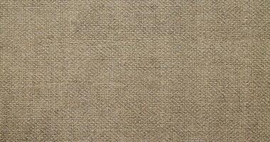 Natural linen material textile canvas Fabric texture background Close-up detail of fabric natural color Hemp material pattern design wallpaper. can be used as background or for graphic design photo