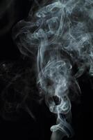 Abstract white smoke texture moves on black background Plume of smoke wave design wallpaper. Design element. Abstract texture photo