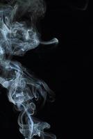 Abstract white smoke texture moves on black background Plume of smoke wave design wallpaper. Design element. Abstract texture photo