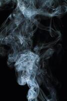 Abstract white smoke texture moves on black background Plume of smoke wave design wallpaper. Design element. Abstract texture photo
