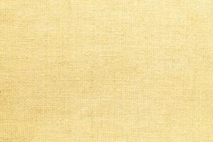 Natural linen material textile canvas Fabric texture background Close-up detail of fabric natural color Hemp material pattern design wallpaper. can be used as background or for graphic design photo