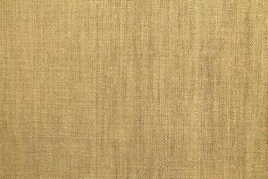 Natural linen material textile canvas Fabric texture background Close-up detail of fabric natural color Hemp material pattern design wallpaper. can be used as background or for graphic design photo