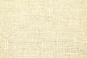 Natural linen material textile canvas Fabric texture background Close-up detail of fabric natural color Hemp material pattern design wallpaper. can be used as background or for graphic design photo