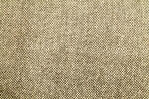 Natural linen material textile canvas Fabric texture background Close-up detail of fabric natural color Hemp material pattern design wallpaper. can be used as background or for graphic design photo