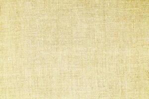 Natural linen material textile canvas Fabric texture background Close-up detail of fabric natural color Hemp material pattern design wallpaper. can be used as background or for graphic design photo
