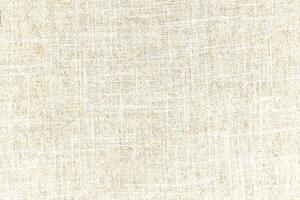 Natural linen material textile canvas Fabric texture background Close-up detail of fabric natural color Hemp material pattern design wallpaper. can be used as background or for graphic design photo