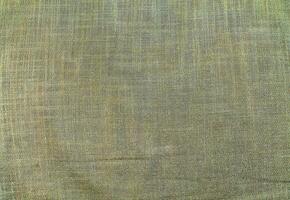 Natural linen material textile canvas Fabric texture background Close-up detail of fabric natural color Hemp material pattern design wallpaper. can be used as background or for graphic design photo