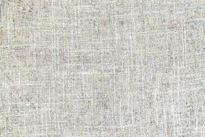 Natural linen material textile canvas Fabric texture background Close-up detail of fabric natural color Hemp material pattern design wallpaper. can be used as background or for graphic design photo