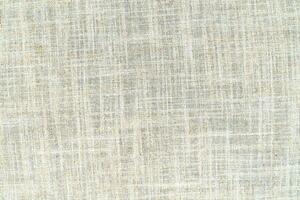 Natural linen material textile canvas Fabric texture background Close-up detail of fabric natural color Hemp material pattern design wallpaper. can be used as background or for graphic design photo