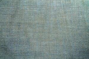 Natural linen material textile canvas Fabric texture background Close-up detail of fabric natural color Hemp material pattern design wallpaper. can be used as background or for graphic design photo