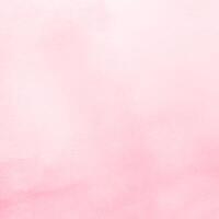 A pink watercolor background with a white background photo