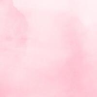 A pink watercolor background with a white background photo