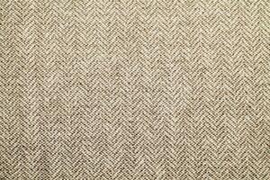 Natural linen material textile canvas Fabric texture background Close-up detail of fabric natural color Hemp material pattern design wallpaper. can be used as background or for graphic design photo