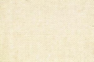 Natural linen material textile canvas Fabric texture background Close-up detail of fabric natural color Hemp material pattern design wallpaper. can be used as background or for graphic design photo