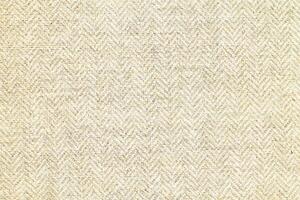Natural linen material textile canvas Fabric texture background Close-up detail of fabric natural color Hemp material pattern design wallpaper. can be used as background or for graphic design photo