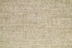 Natural linen material textile canvas Fabric texture background Close-up detail of fabric natural color Hemp material pattern design wallpaper. can be used as background or for graphic design photo