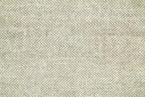 Natural linen material textile canvas Fabric texture background Close-up detail of fabric natural color Hemp material pattern design wallpaper. can be used as background or for graphic design photo
