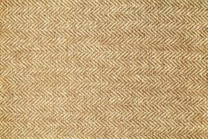 Natural linen material textile canvas Fabric texture background Close-up detail of fabric natural color Hemp material pattern design wallpaper. can be used as background or for graphic design photo