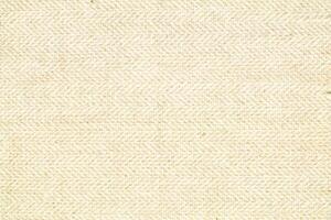 Natural linen material textile canvas Fabric texture background Close-up detail of fabric natural color Hemp material pattern design wallpaper. can be used as background or for graphic design photo