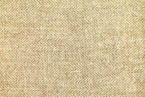 Natural linen material textile canvas Fabric texture background Close-up detail of fabric natural color Hemp material pattern design wallpaper. can be used as background or for graphic design photo