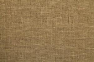 Natural linen material textile canvas Fabric texture background Close-up detail of fabric natural color Hemp material pattern design wallpaper. can be used as background or for graphic design photo