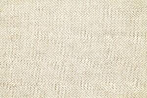 Natural linen material textile canvas Fabric texture background Close-up detail of fabric natural color Hemp material pattern design wallpaper. can be used as background or for graphic design photo